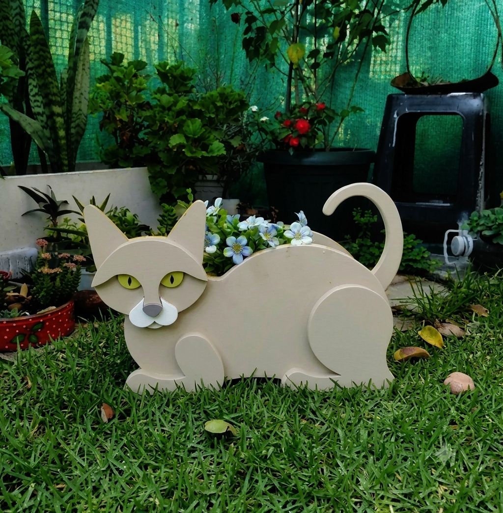 White cat-shaped desk planter by Rootly